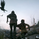two young children run through a pile of bloody corpses as birds fly above in a plague tale innocence on xbox game pass